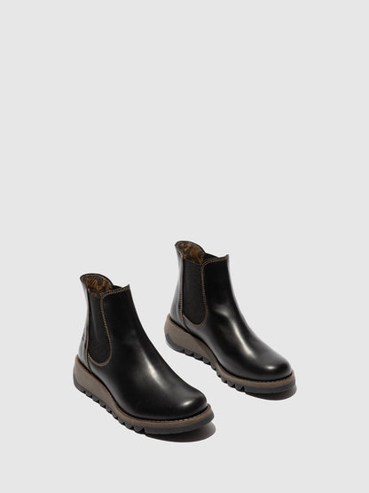 Botins Chelsea em pele FLY London SALV preto