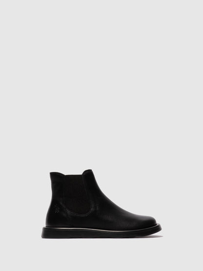 Botins Chelsea em pele FLY London TICH preto