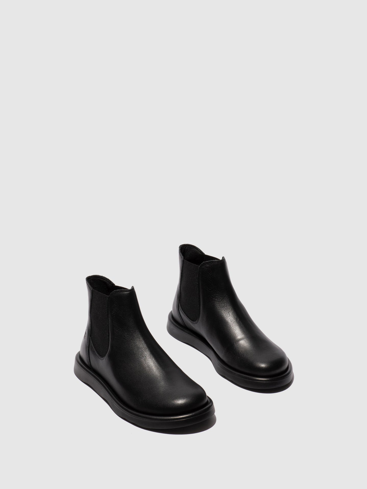 Botins Chelsea em pele FLY London TICH preto