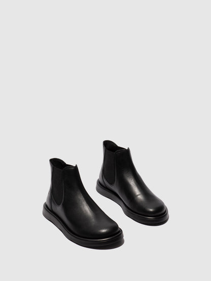 Botins Chelsea em pele FLY London TICH preto