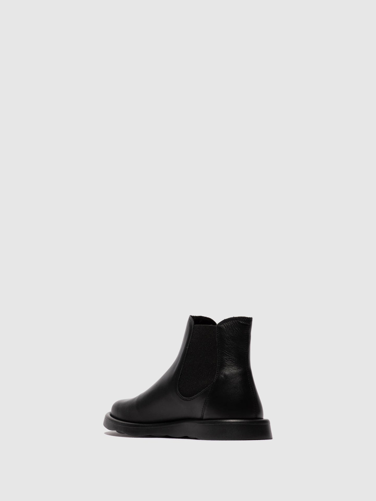 Botins Chelsea em pele FLY London TICH preto